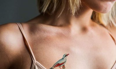 Body-Treatments_0001_close-up-of-tattoo-on-the-chest-of-a-woman-PU7BDGN.jpg